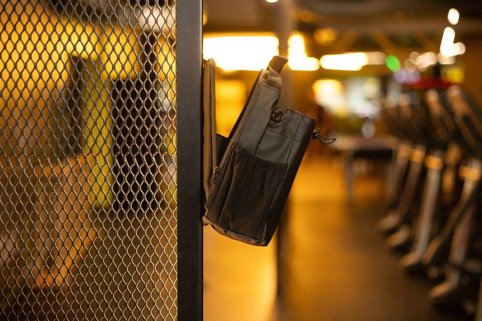 Gym hygiene bacteria stats Australia - dirty gym floor with equipment and gym bag